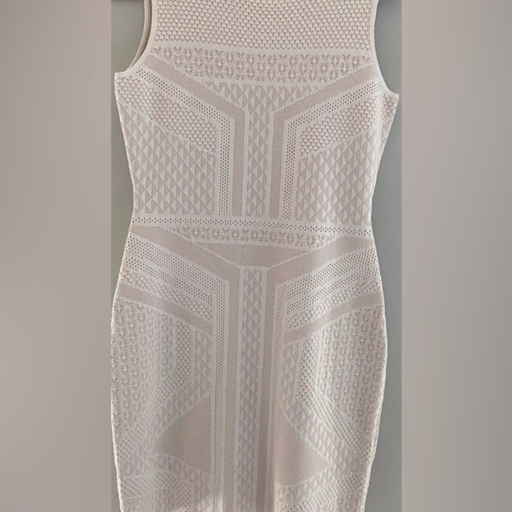 Carmen Marc Valvo off-white dress with beige undertones